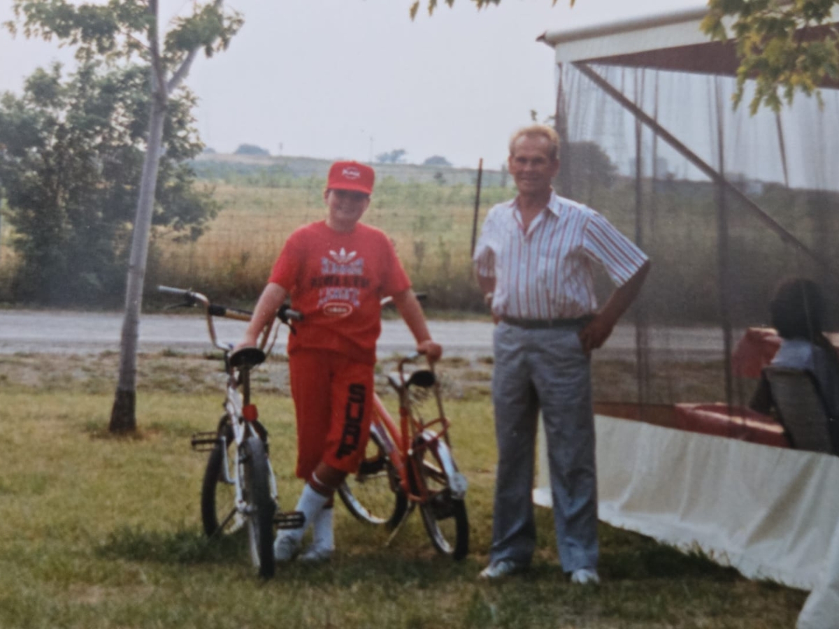 Jeff and his grandfather, at the store
